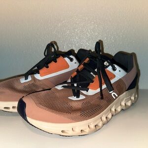 On Running Women's Sneakers in Orange and Black